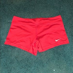red nike shorts